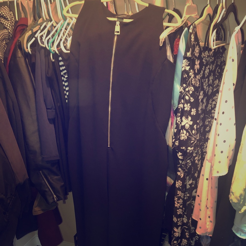 Mid calf length jumpsuit. Zip up only worn once.